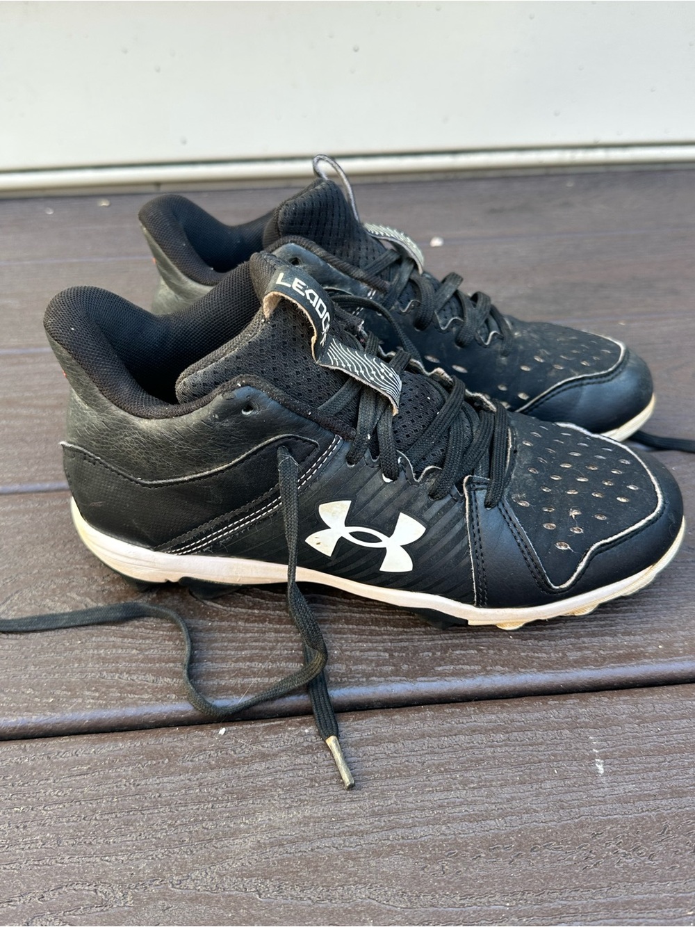 Under Armour Kids Black and White Sports Cleats